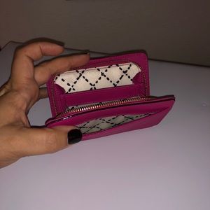 Hot pink wallet. Used. Great condition.
